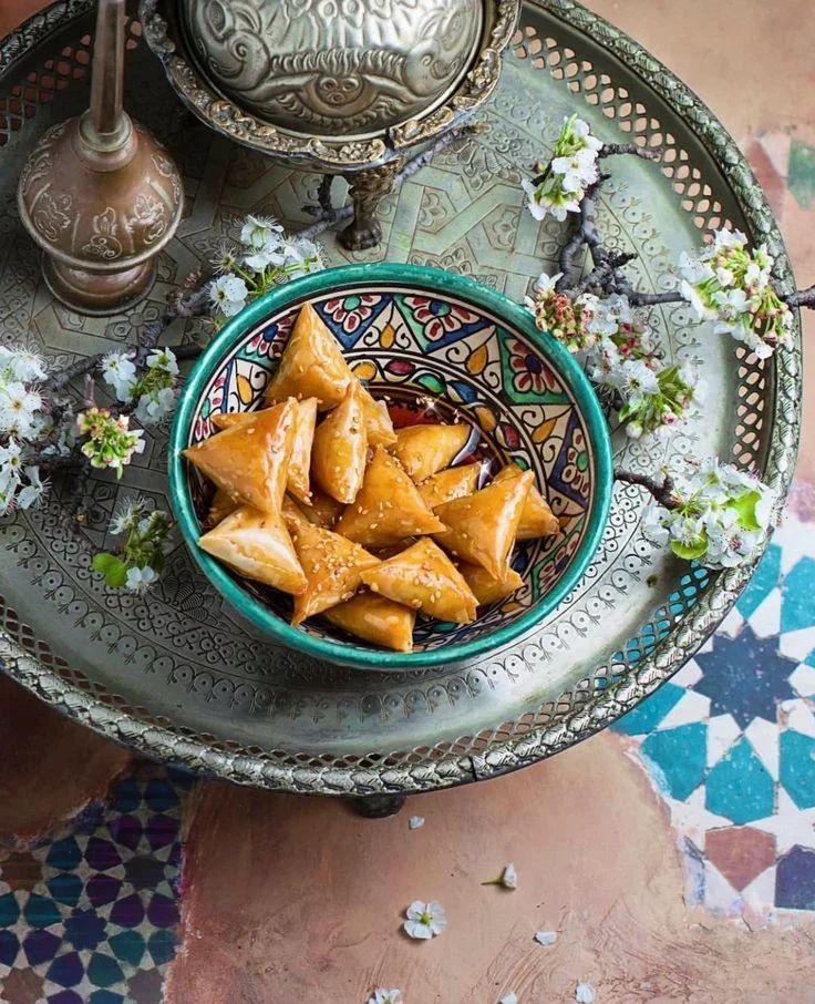 Image of a few Briouats in a bowl with nice decoration