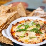 Melty Marvel: Dive into the World of Queso Fundido!